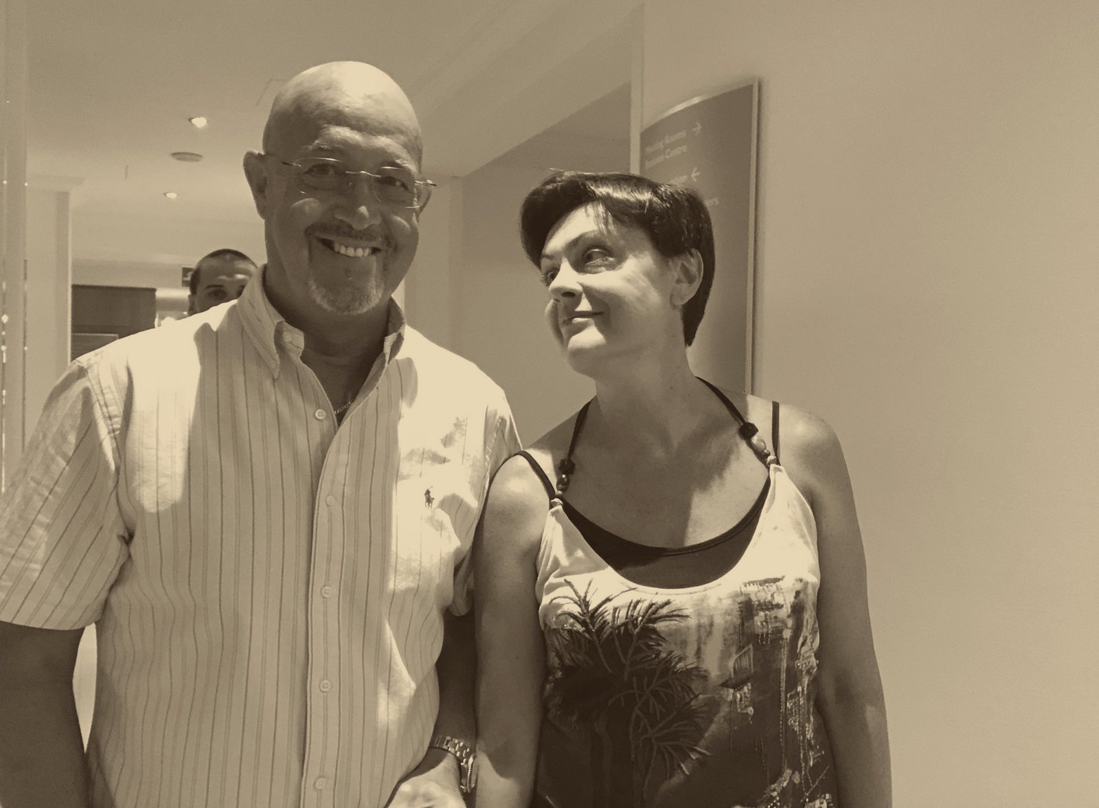 Andy and his wife in a warm sepia photograph